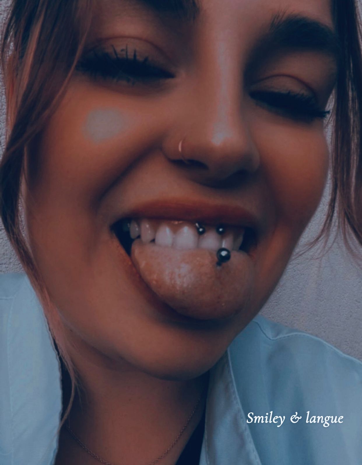 Piercing smiley et piercing langue realises par Hakuna Tattoo Arpajon Essonne 91
